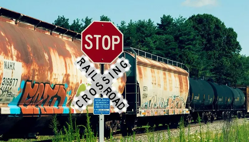 railroad crossing with stop sign