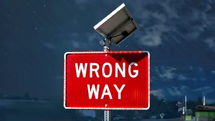 flashing wrong way sign