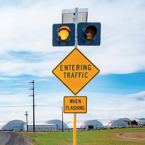 intersection conflict resolution with flashing beacons